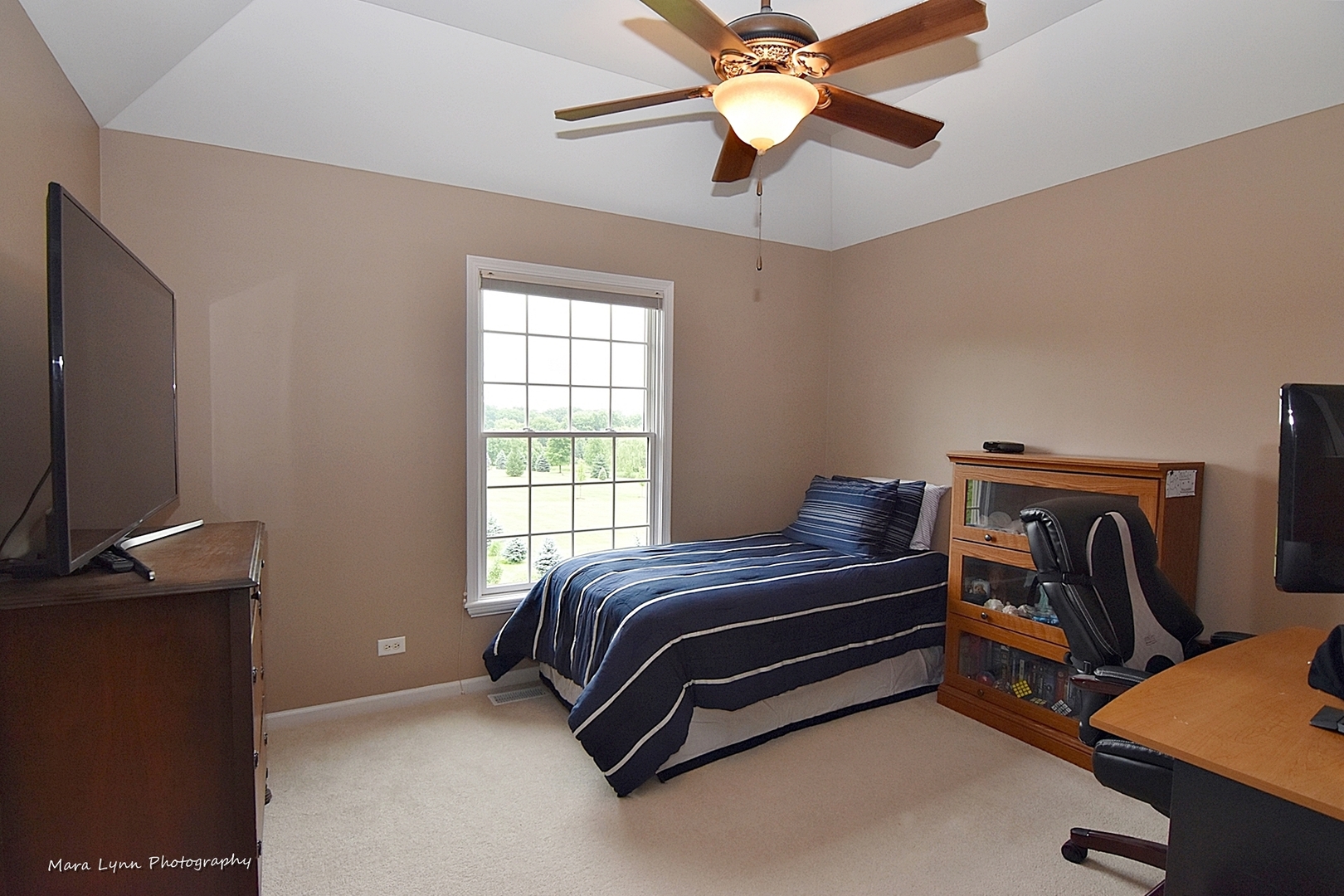 41-w035 Brown Road St. Charles, IL 60175 - Photo 22 of 33 a bedroom with a bed and a chandelier