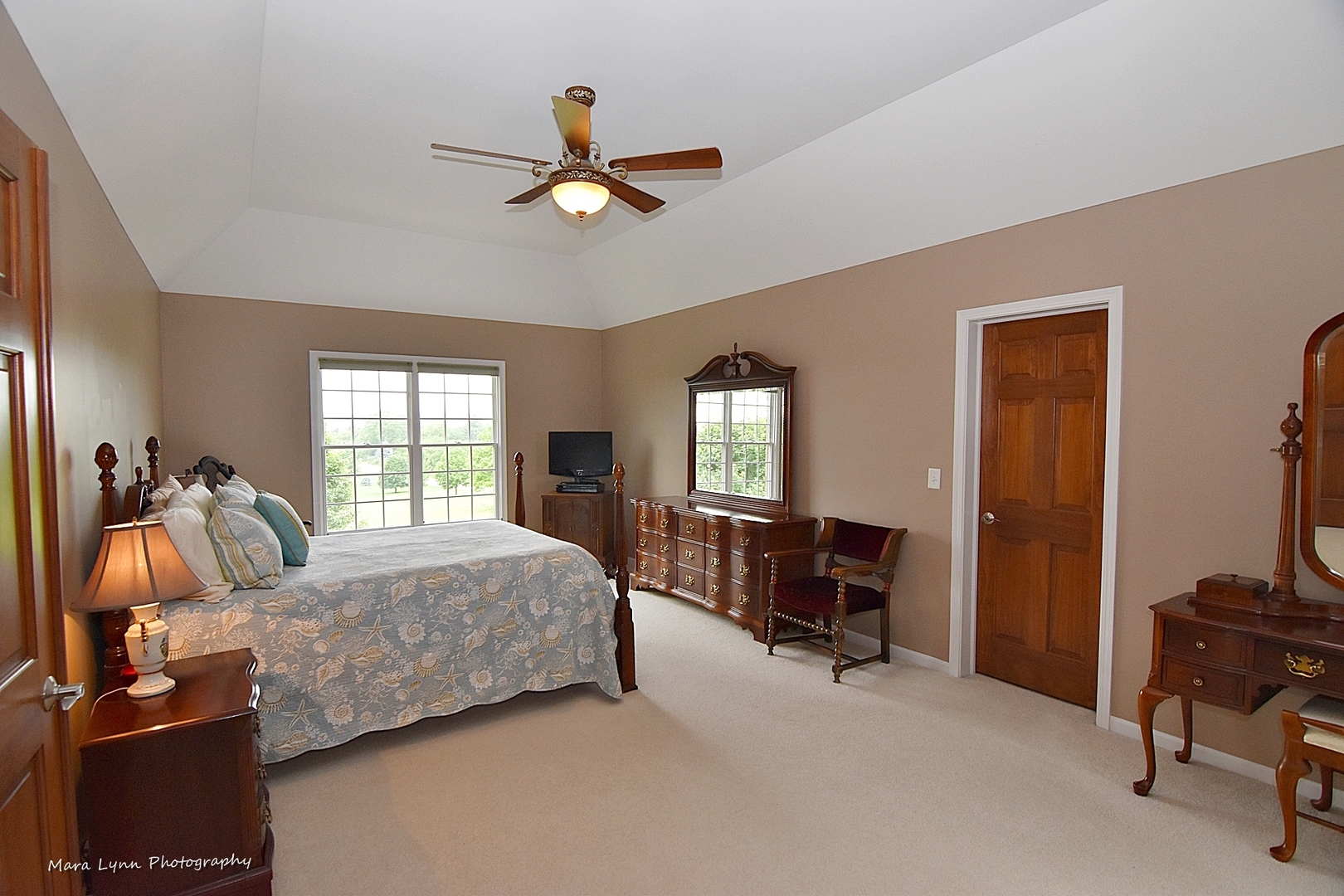 41-w035 Brown Road St. Charles, IL 60175 - Photo 26 of 33 a bedroom with a bed and a chandelier