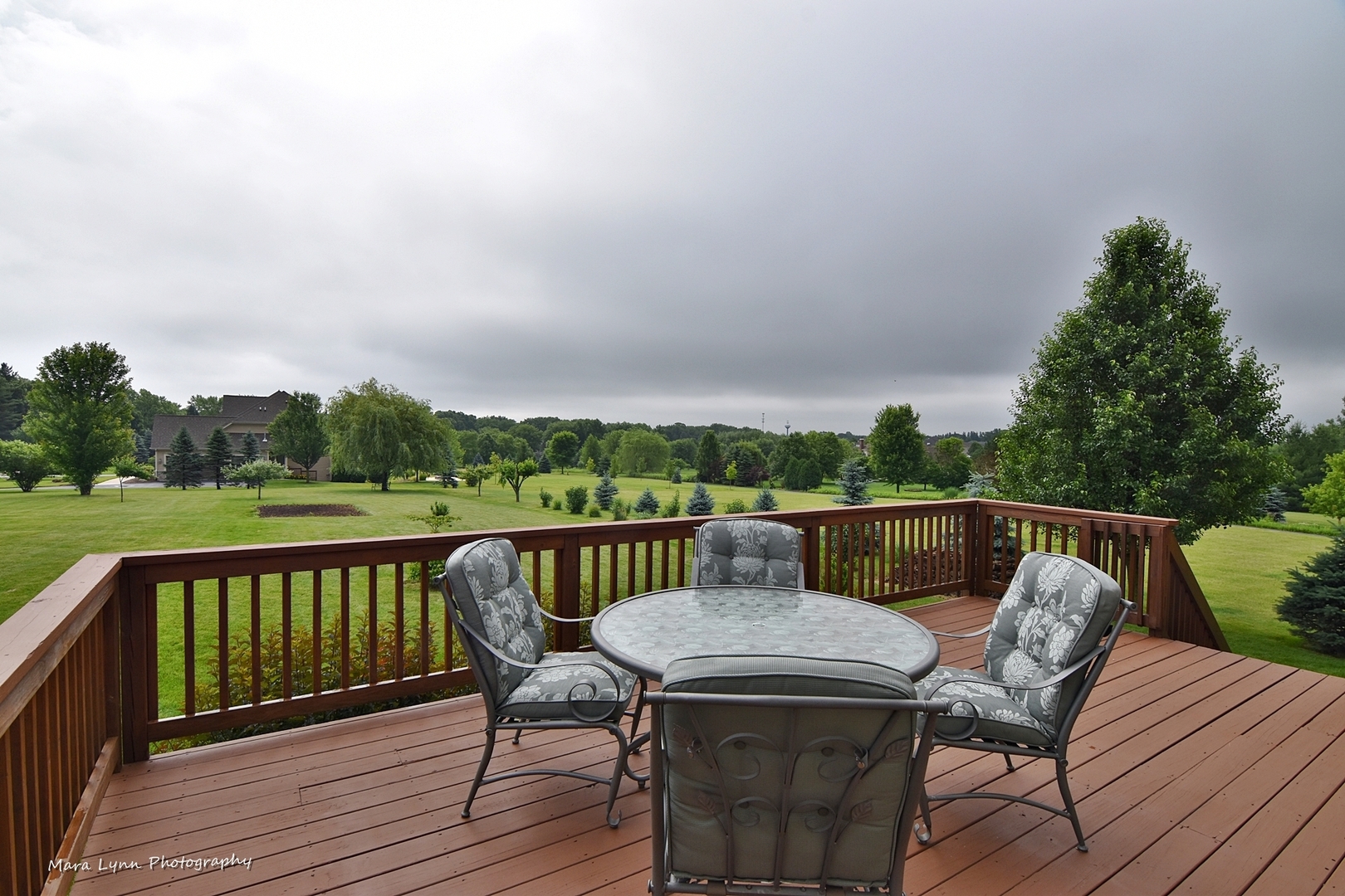 41-w035 Brown Road St. Charles, IL 60175 - Photo 29 of 33 a view of a balcony with two chairs and a table