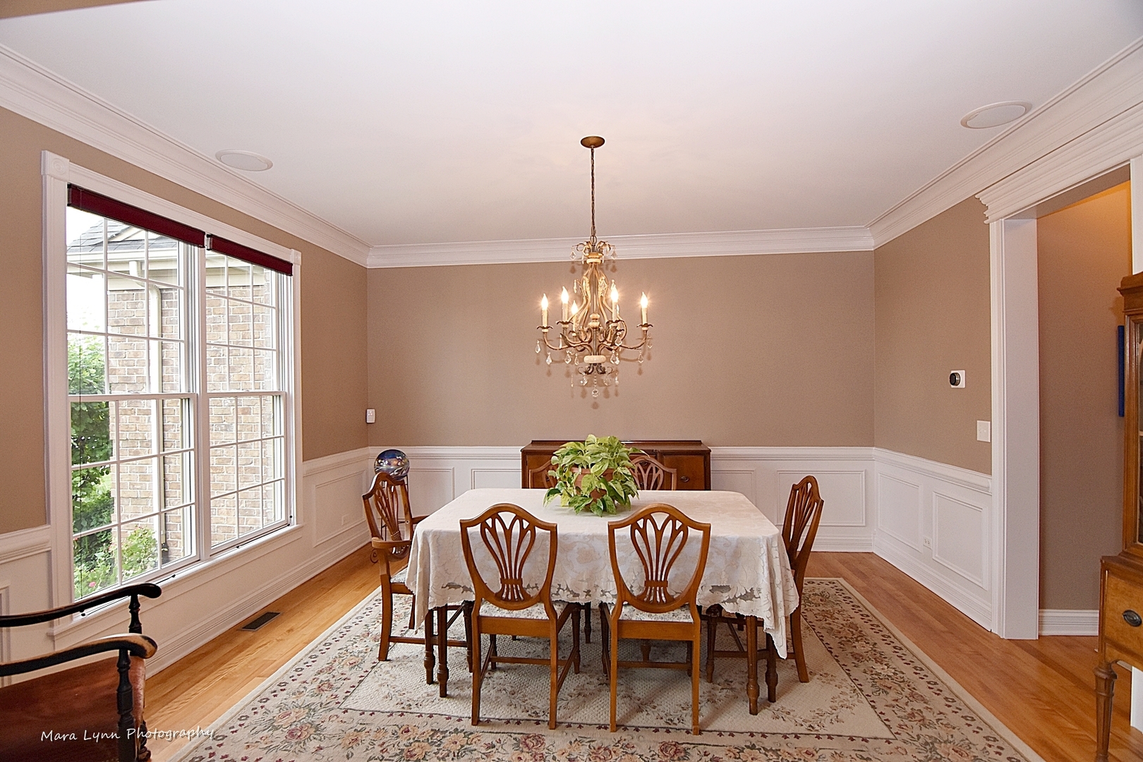 41-w035 Brown Road St. Charles, IL 60175 - Photo 5 of 33 a view of a dining room with furniture a chandelier and wooden floor