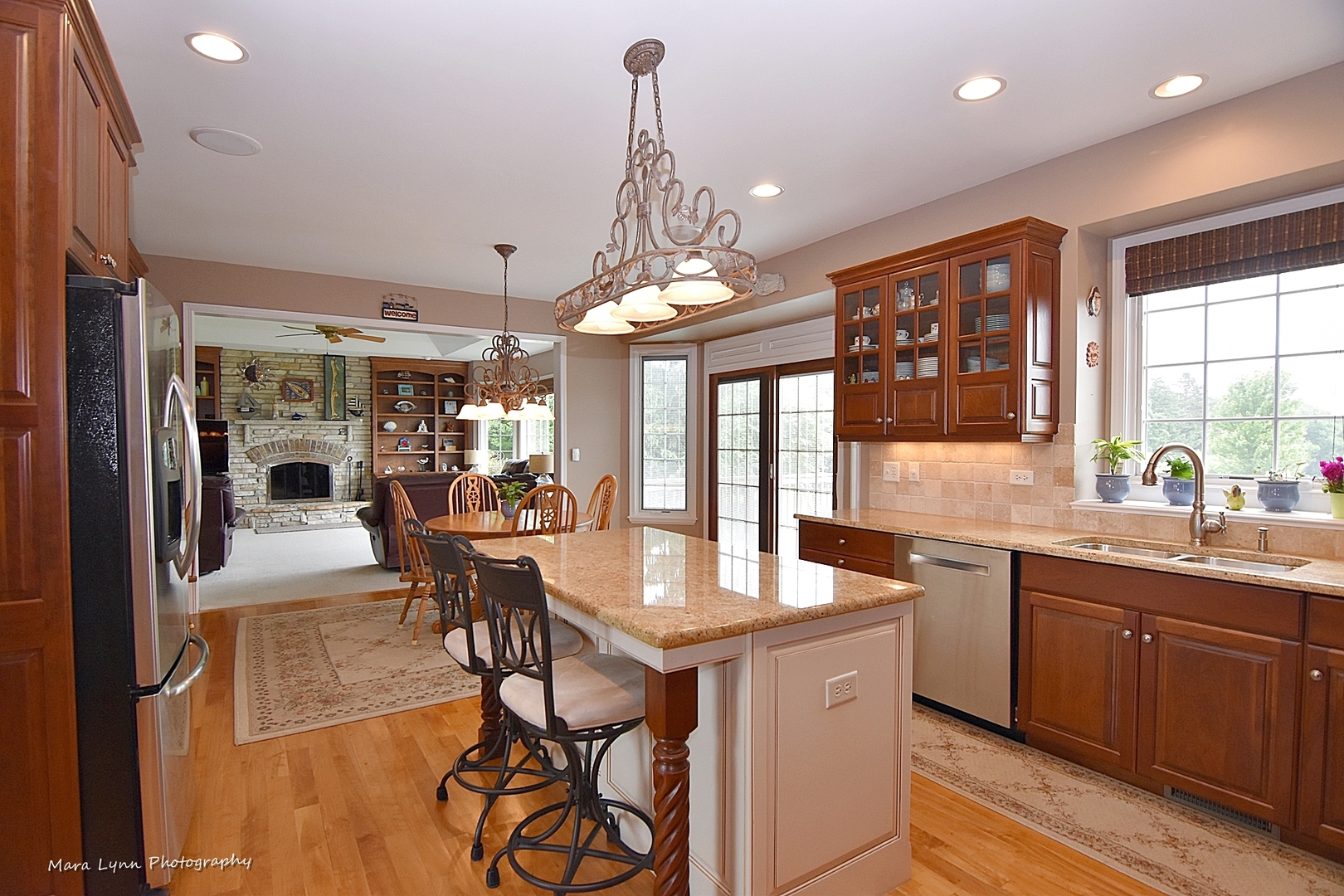41-w035 Brown Road St. Charles, IL 60175 - Photo 9 of 33 a dining room with granite countertop a sink table and chairs