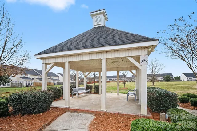 a house view with a outdoor space