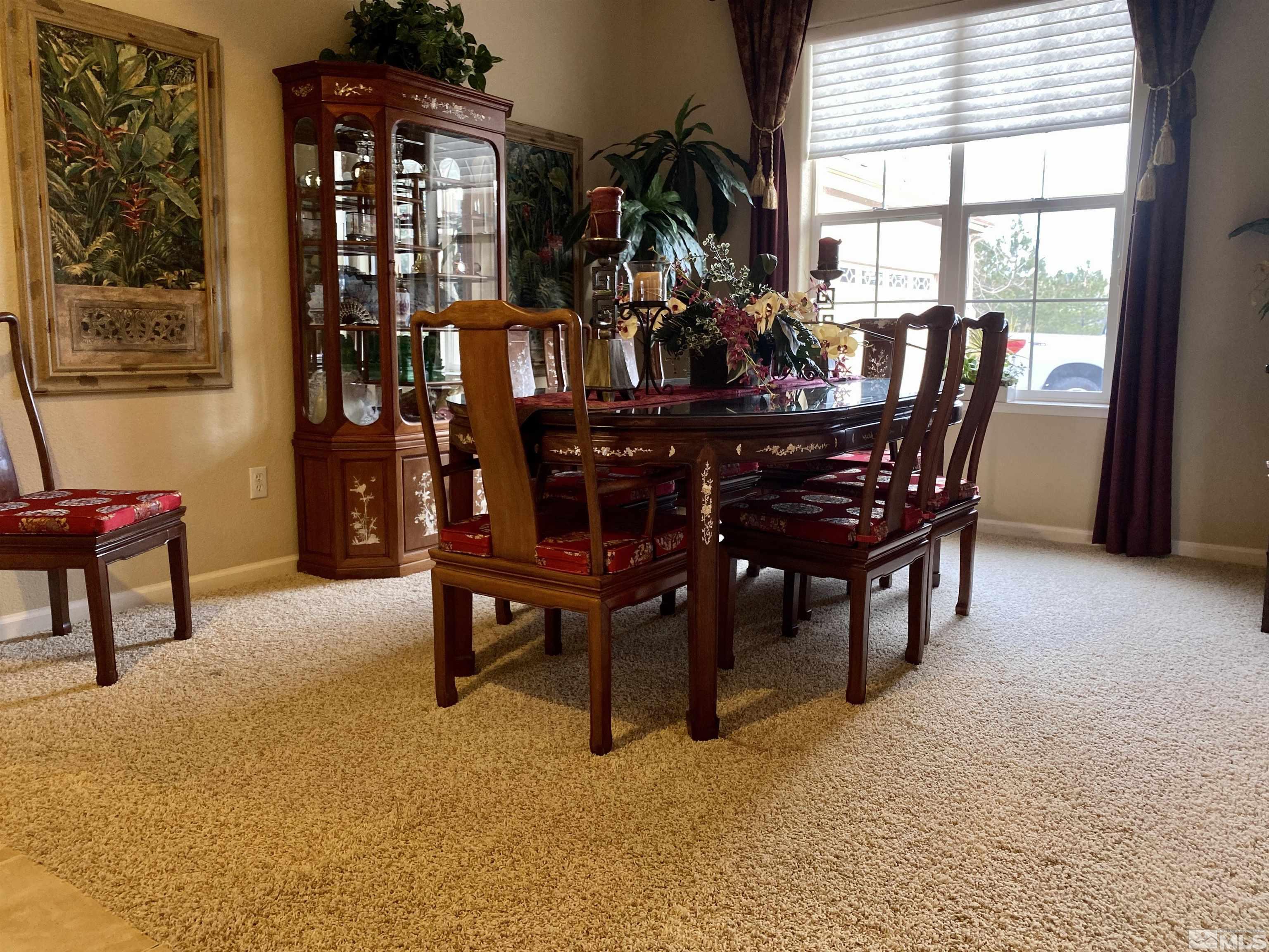 755 Sandoval Road Reno, NV 89511 - Photo 8 of 40 a view of a dining room with furniture and window