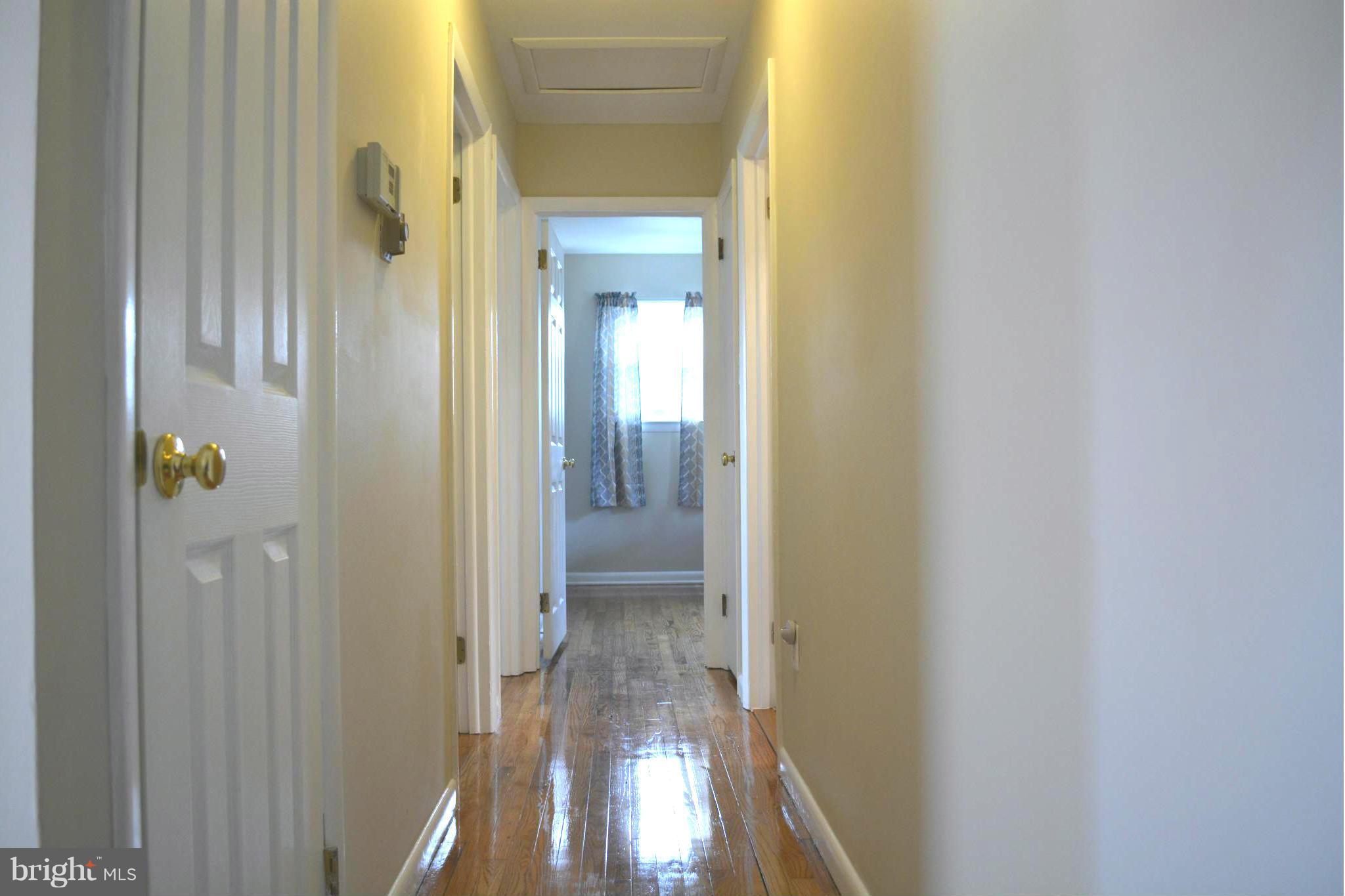 2208 Snow Road Edgewood, MD 21040 - Photo 11 of 23 a view of a bathroom from a hallway