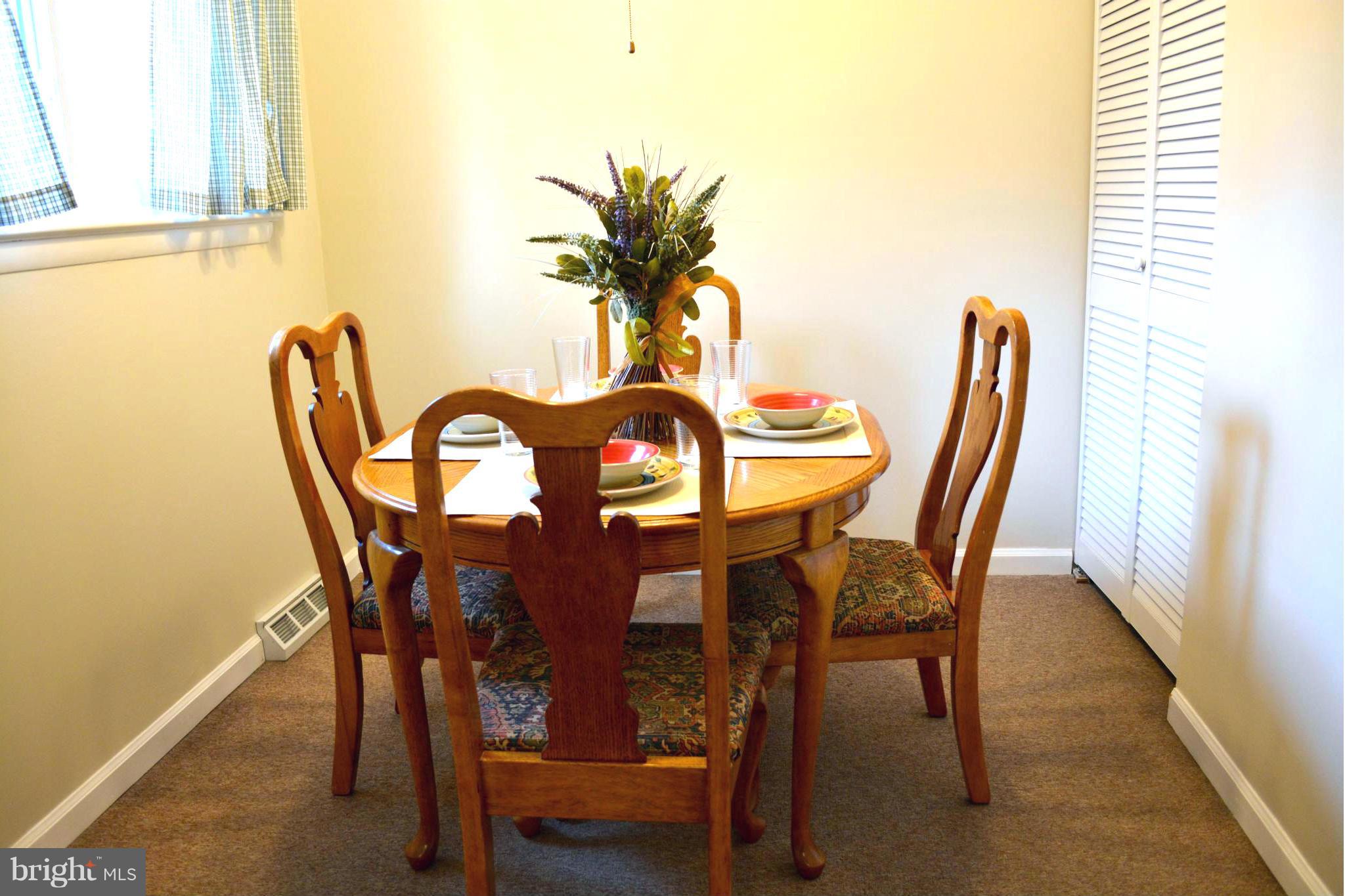 2208 Snow Road Edgewood, MD 21040 - Photo 12 of 23 a view of a dining room with furniture and window