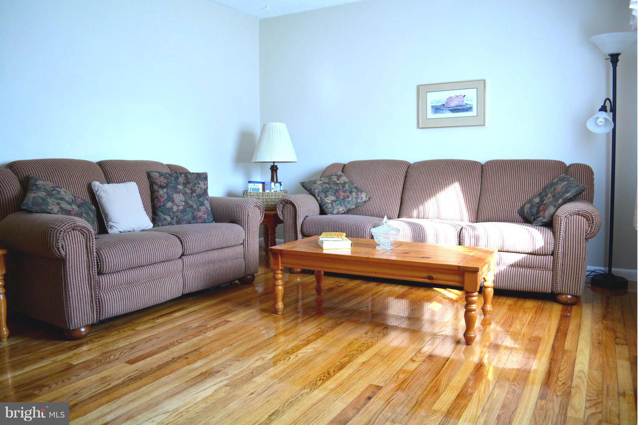 2208 Snow Road Edgewood, MD 21040 - Photo 17 of 23 a living room with furniture and a wooden floor