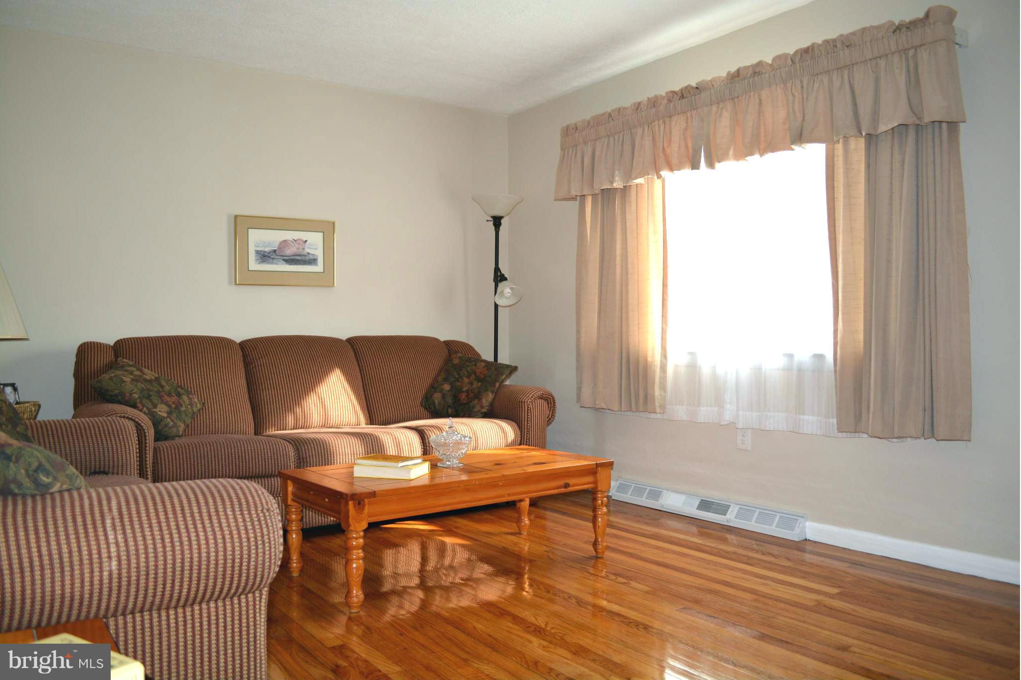 2208 Snow Road Edgewood, MD 21040 - Photo 19 of 23 a living room with furniture and a window