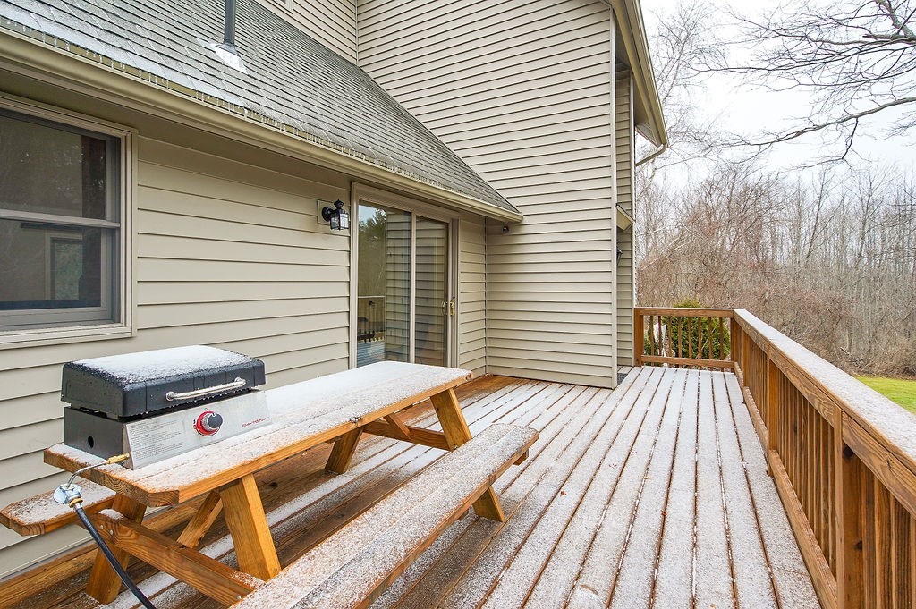200 Brimfield Road, Unit 200 Monson, MA 01057 - Photo 11 of 13 a view of a roof deck with wooden floor and fence
