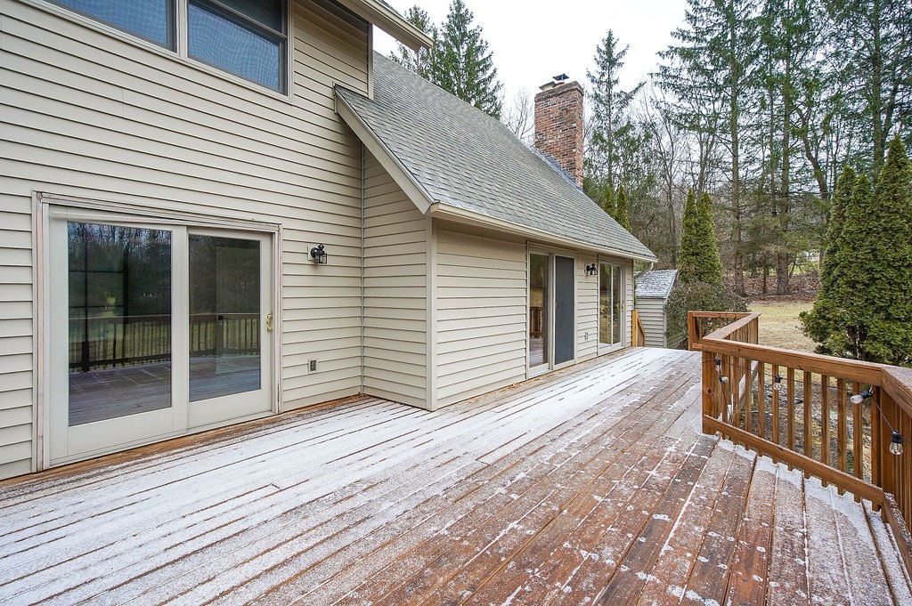 200 Brimfield Road, Unit 200 Monson, MA 01057 - Photo 12 of 13 a view of backyard with a deck and wooden floor