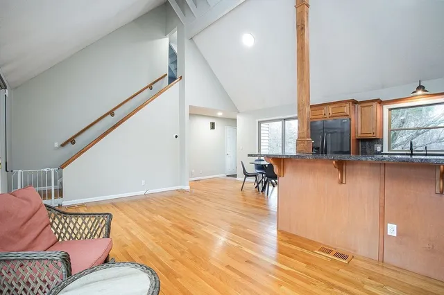 a living room with furniture and a table