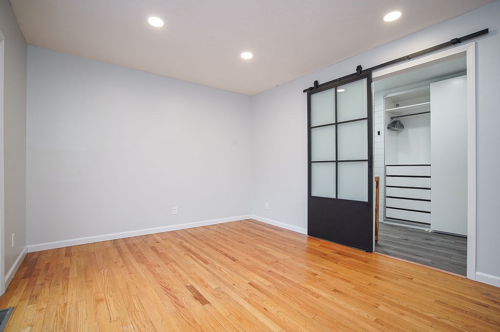 200 Brimfield Road, Unit 200 Monson, MA 01057 - Photo 7 of 13 a view of empty room with wooden floor