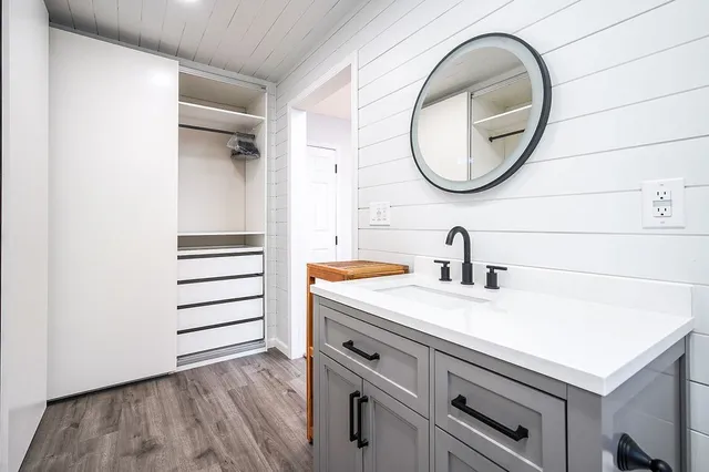 a view of a sink and a mirror