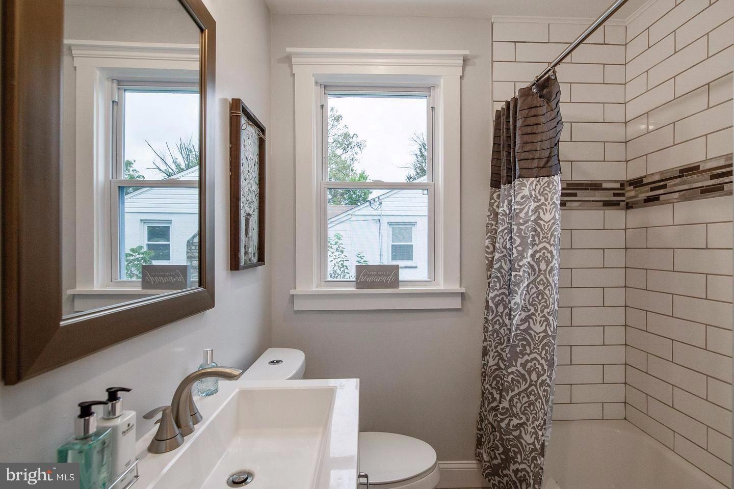 6226 Tramore Road Baltimore, MD 21214 - Photo 14 of 30 Main floor Bathroom with beautiful tile