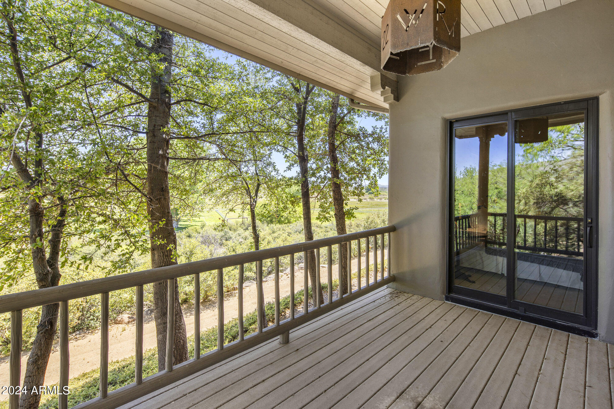 5500 Four Cross Ranch Road Skull Valley, AZ 86338 - Photo 25 of 59 Deck balcony off of bedrooms 2 & 3