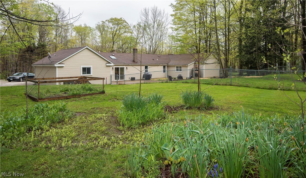 13714 Aquilla Road Burton, OH 44021 - Photo 24 of 27 Huge fenced back yard.