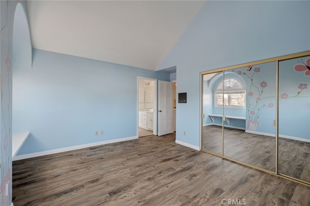 19 Village Circle Manhattan Beach, CA 90266 - Photo 21 of 26 a view of a room with wooden floor and window
