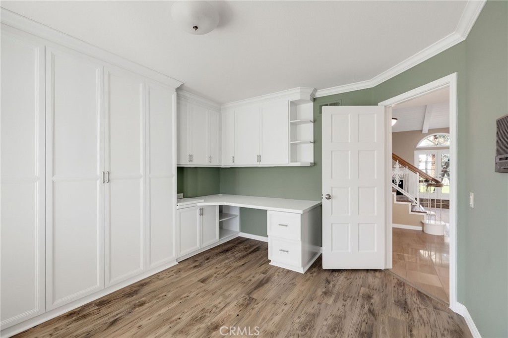 19 Village Circle Manhattan Beach, CA 90266 - Photo 24 of 26 a view of kitchen with wooden floor and electronic appliances