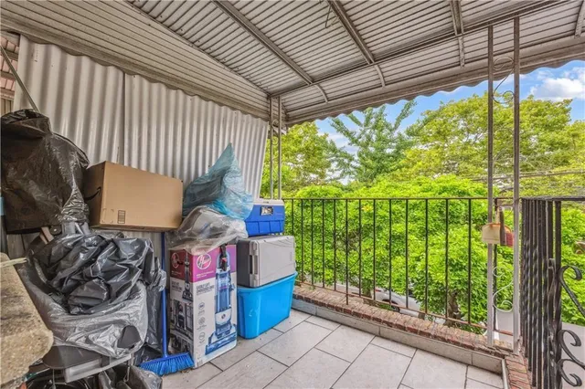 a bed room with furniture and a garden