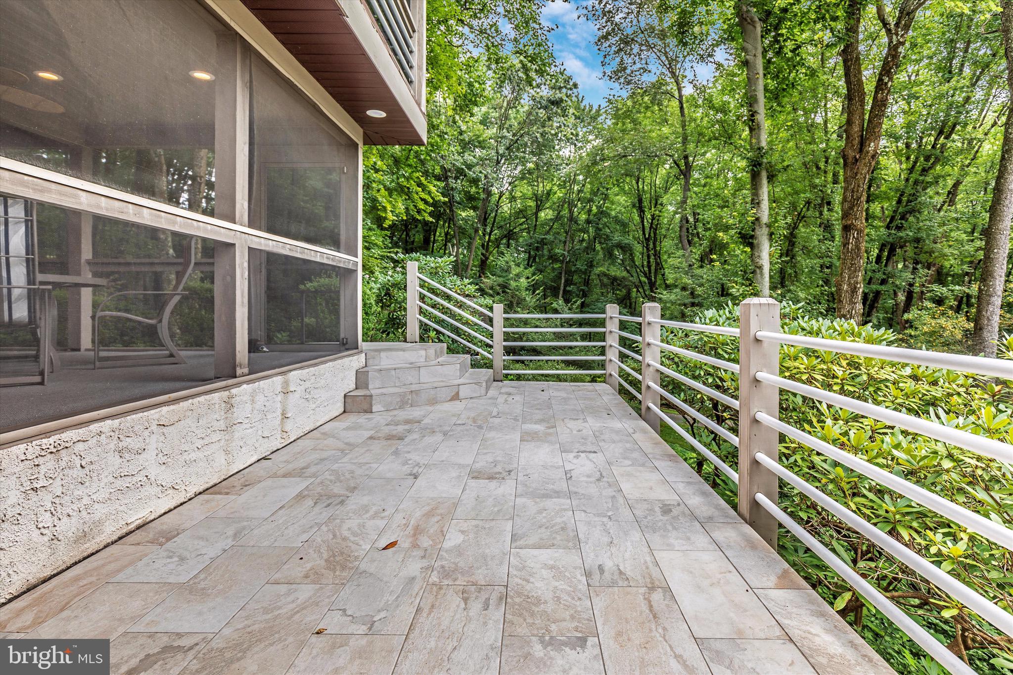1625 Street Road Chester Springs, PA 19425 - Photo 17 of 46 Patio off of the screened-in porch