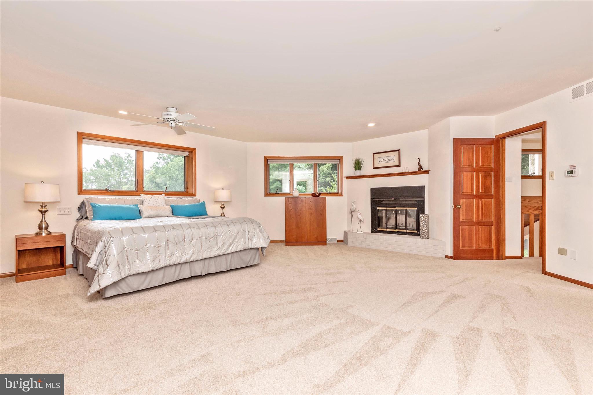 1625 Street Road Chester Springs, PA 19425 - Photo 21 of 46 Owner's bedroom with fireplace