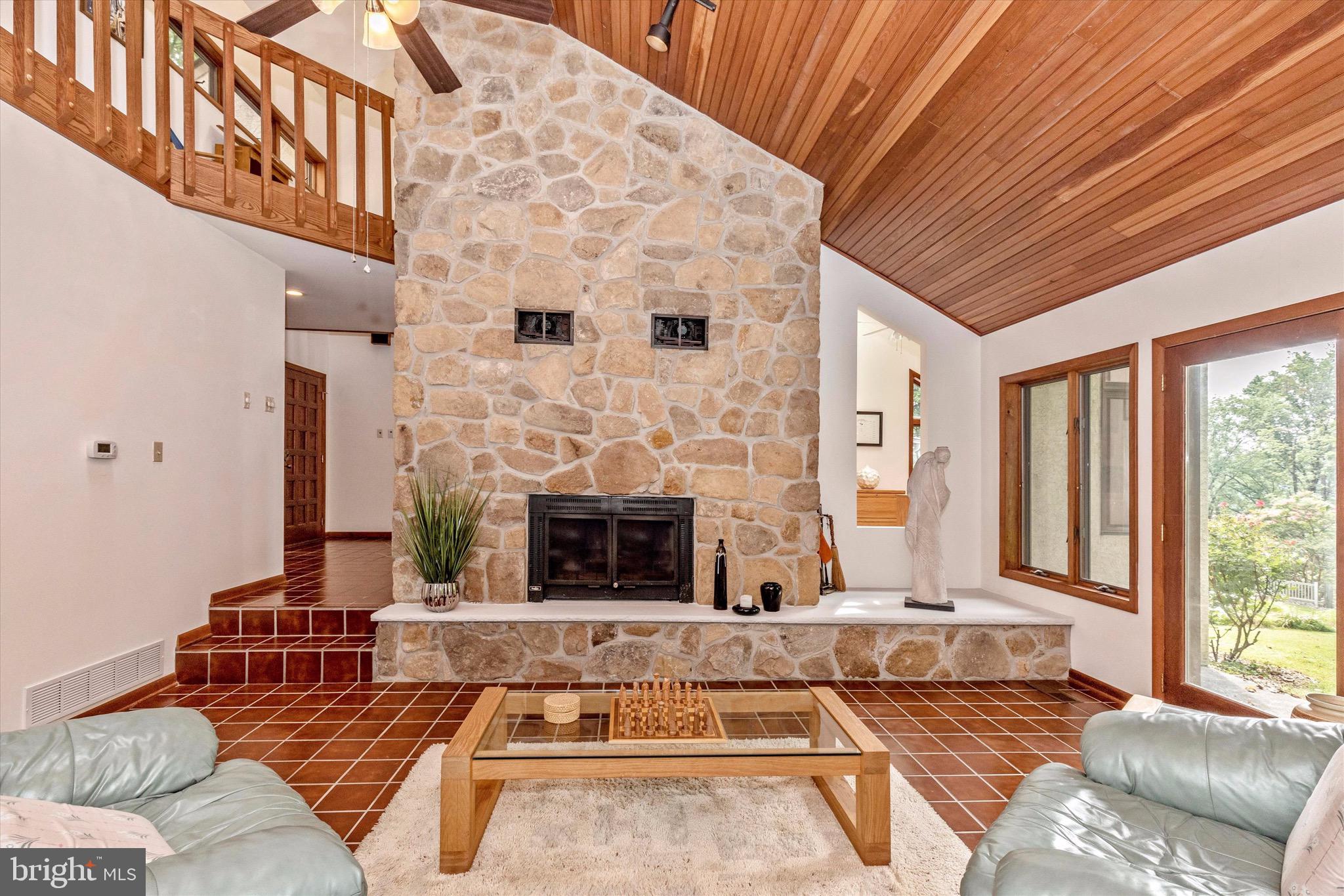 1625 Street Road Chester Springs, PA 19425 - Photo 6 of 46 Living Room with stone fireplace