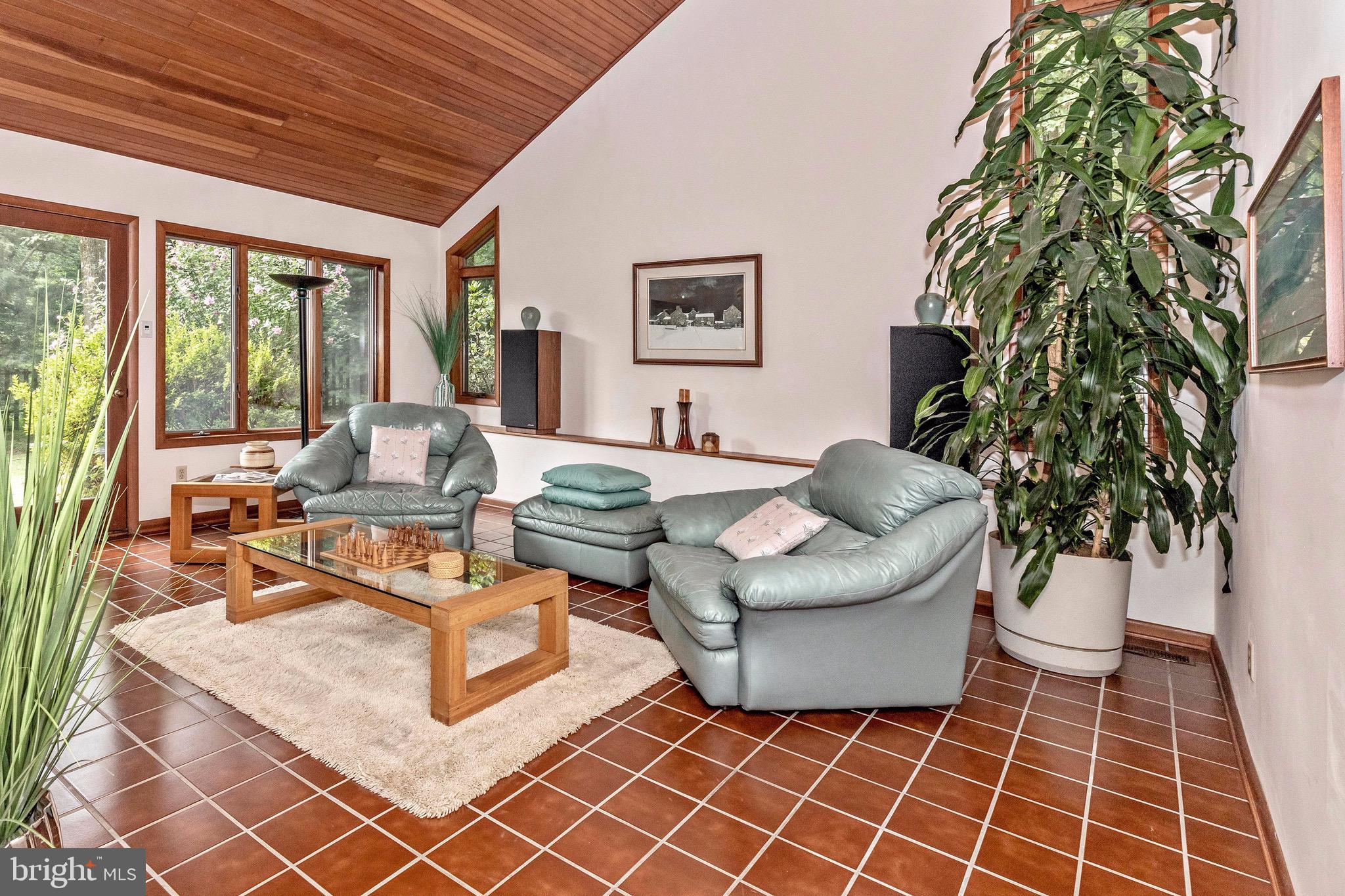 1625 Street Road Chester Springs, PA 19425 - Photo 7 of 46 Living room with vaulted ceiling
