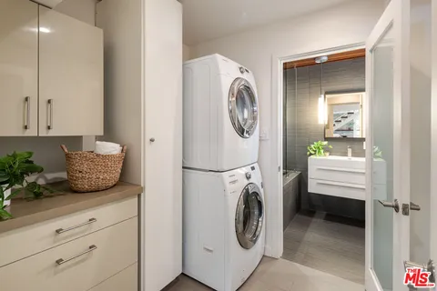 a view of washer and dryer in a utility room