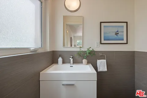 a bathroom with a toilet and a sink