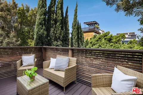 a view of outdoor space with lounge chair