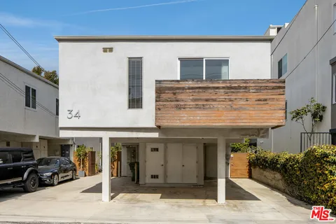 a front view of a building with outdoor space