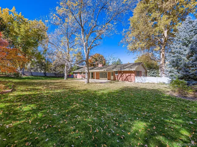 front view of a house with a big yard