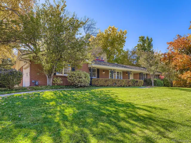 wooden floor in an empty room with a fireplace