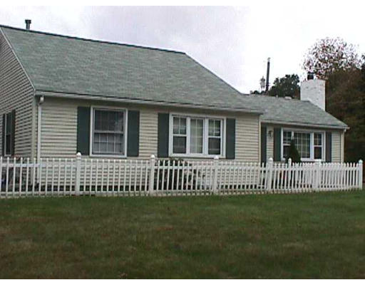 7 Audley Road Springfield, MA 01118 - Photo 1 of 1 a front view of a house with a garden