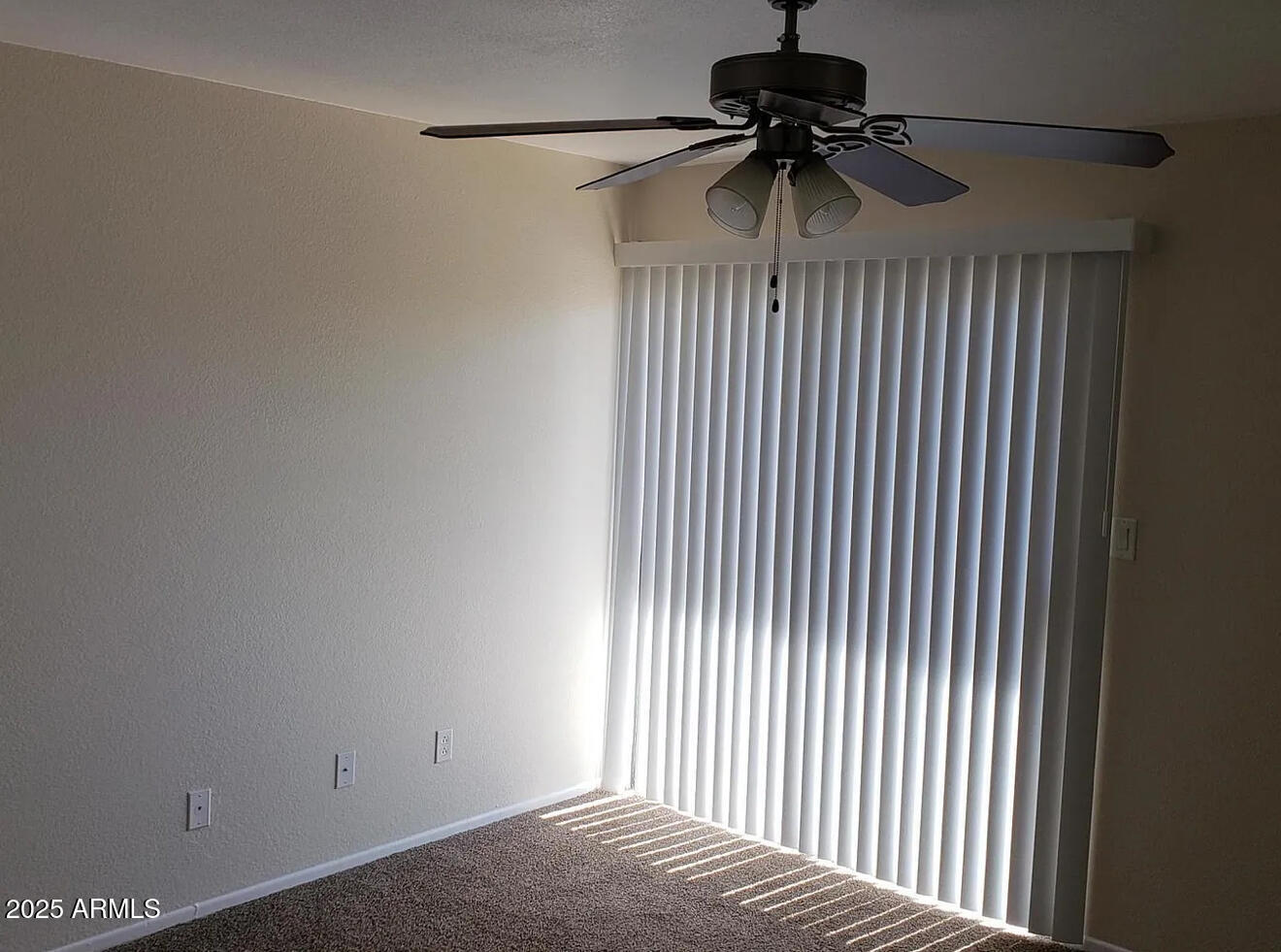 985 North Granite Reef Road, Unit 156 Scottsdale, AZ 85257 - Photo 11 of 17 a view of a bedroom with a ceiling fan and a window