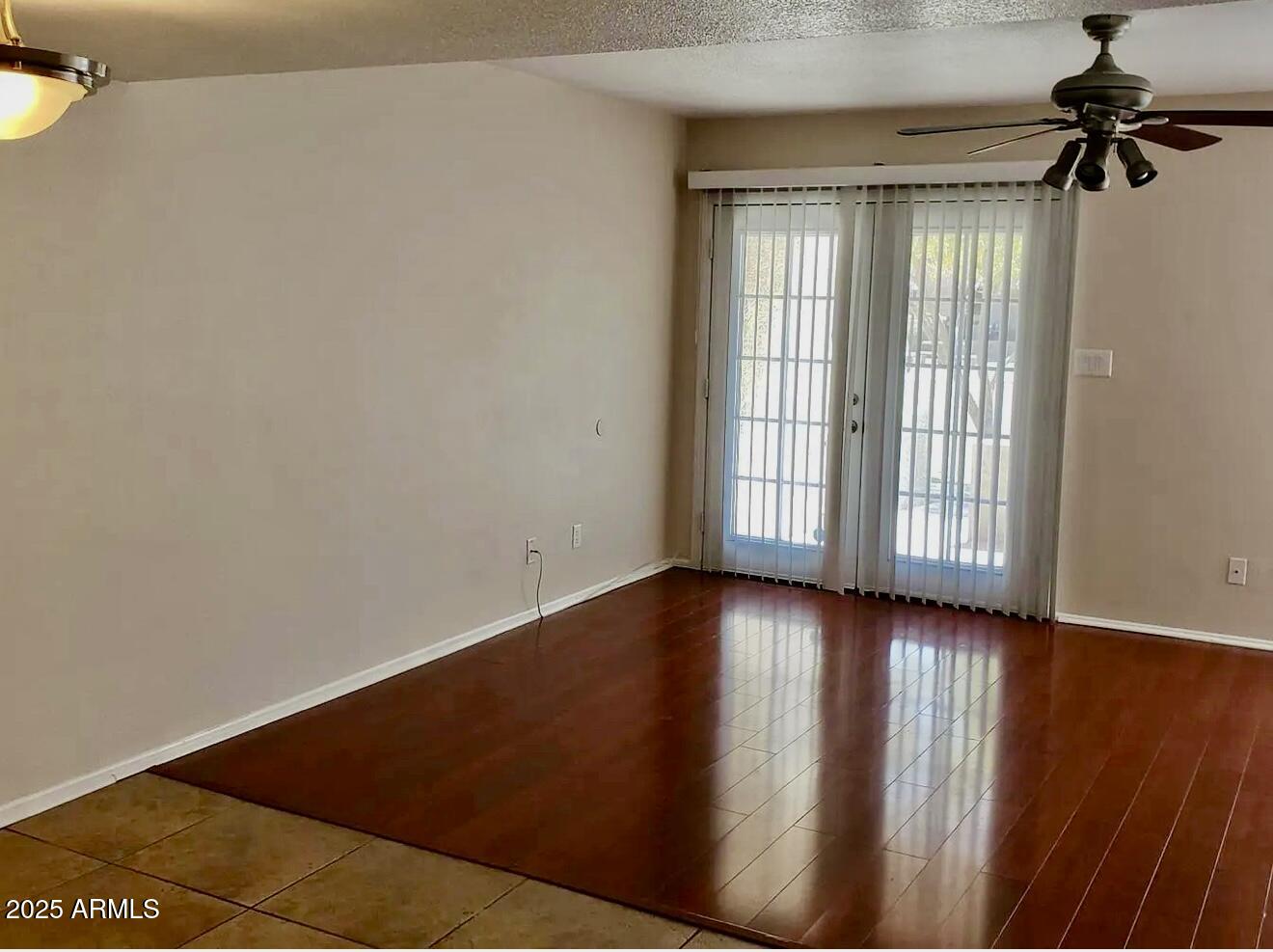 985 North Granite Reef Road, Unit 156 Scottsdale, AZ 85257 - Photo 3 of 17 a view of an empty room with glass door