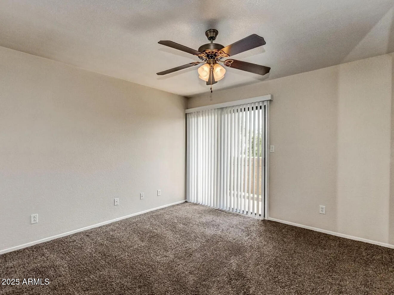985 North Granite Reef Road, Unit 156 Scottsdale, AZ 85257 - Photo 6 of 17 a view of an empty room with a window