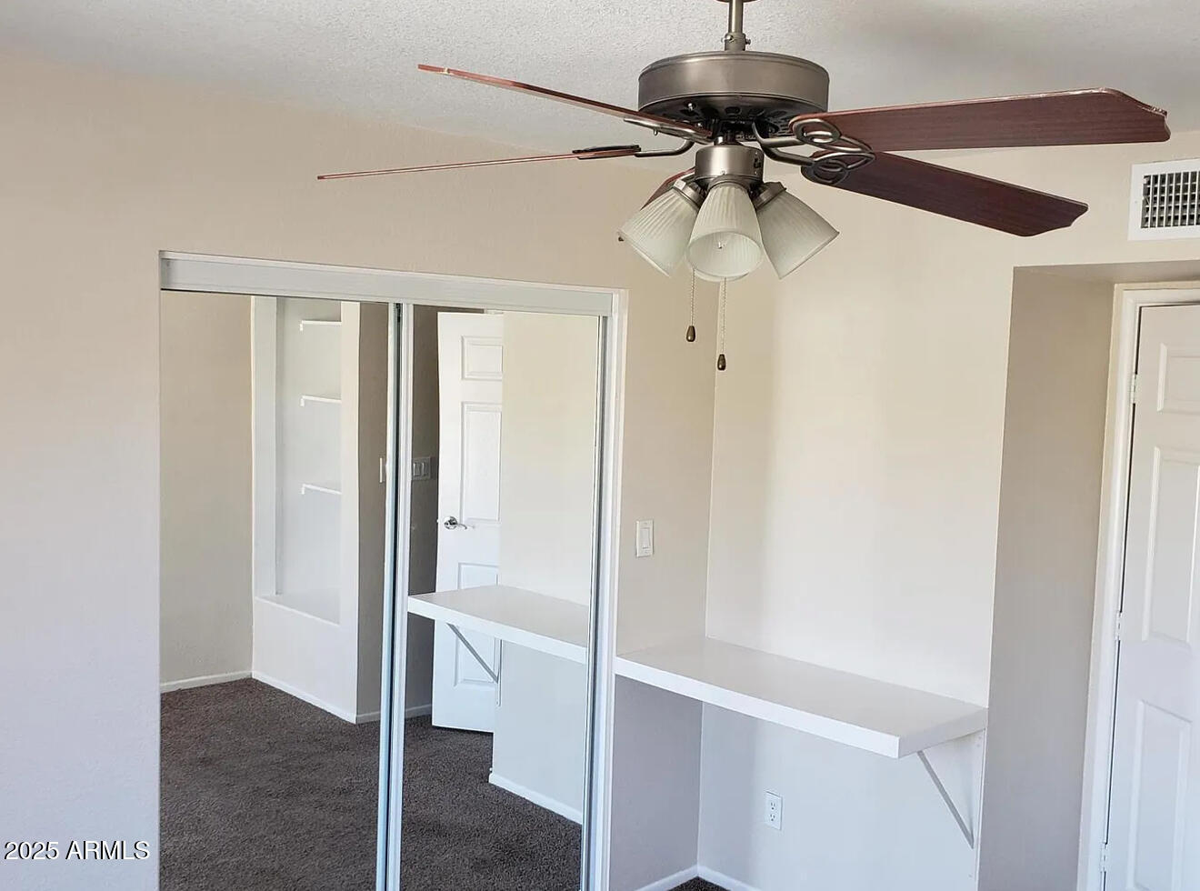 985 North Granite Reef Road, Unit 156 Scottsdale, AZ 85257 - Photo 10 of 17 a view of a chandelier fan in a room