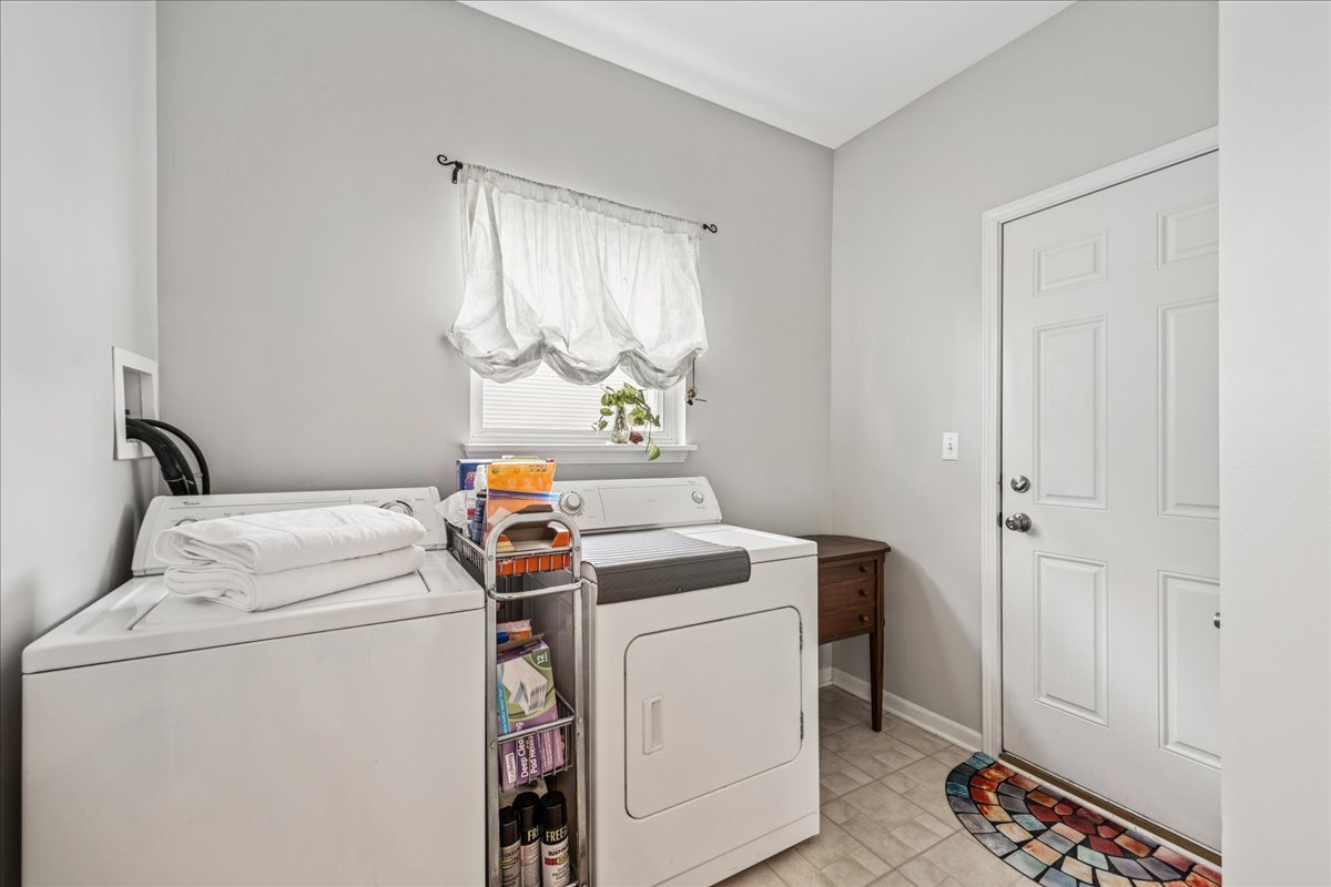 311 Market Street Genoa, IL 60135 - Photo 11 of 24 a utility room with dryer and washer
