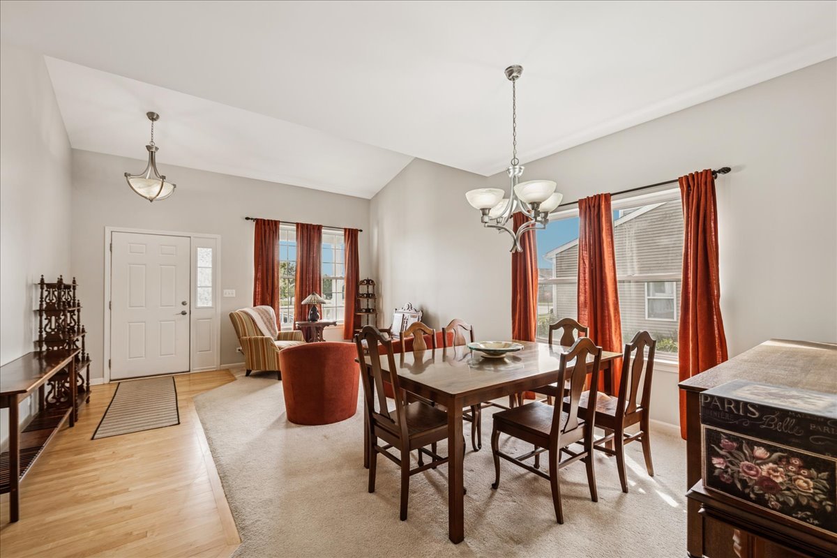 311 Market Street Genoa, IL 60135 - Photo 6 of 24 a view of a dining room with furniture window and wooden floor