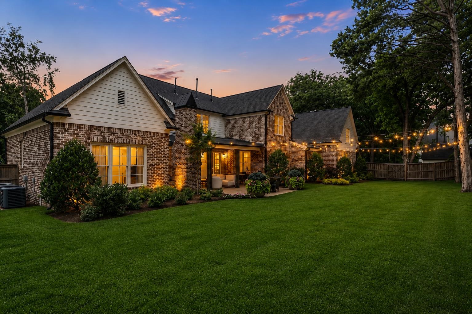 240 Burrows Road Collierville, TN 38017 - Photo 27 of 37 Spacious backyard featuring a manicured lawn, an expansive patio, and mature trees