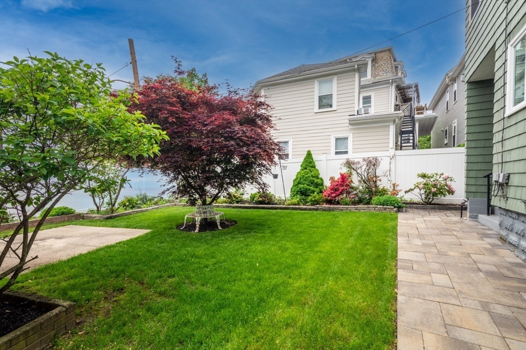 45 Jackson Road Somerville, MA 02145 - Photo 2 of 27 a front view of a house with a yard