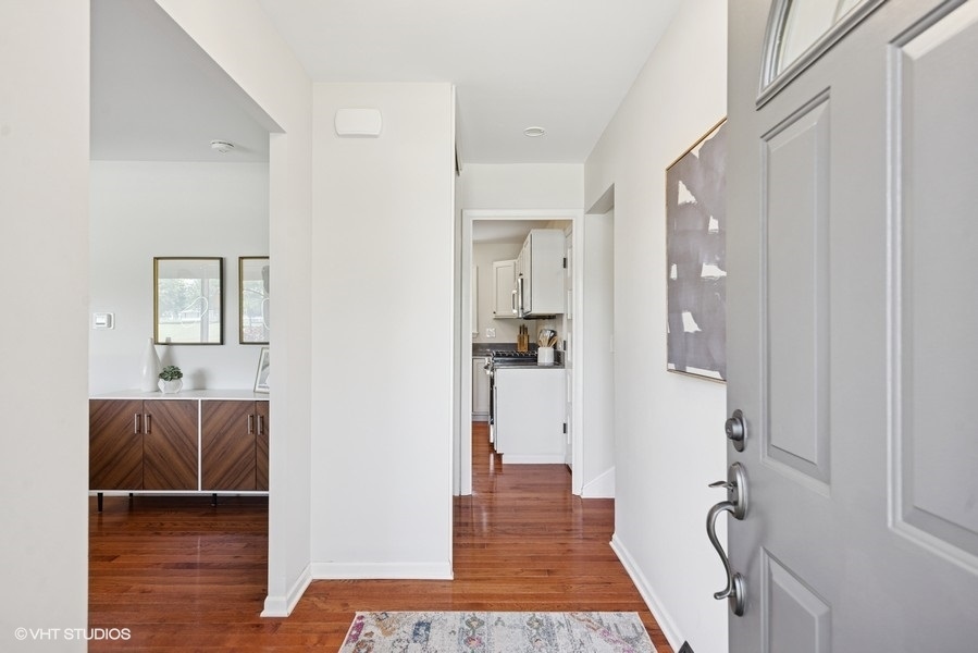 527 Maple Lane Geneva, IL 60134 - Photo 12 of 42 a room with a bed and a view of bathroom
