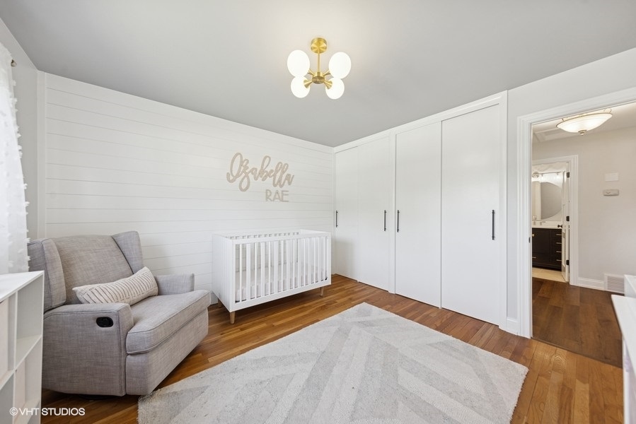 527 Maple Lane Geneva, IL 60134 - Photo 31 of 42 a bedroom with a bed and a couch