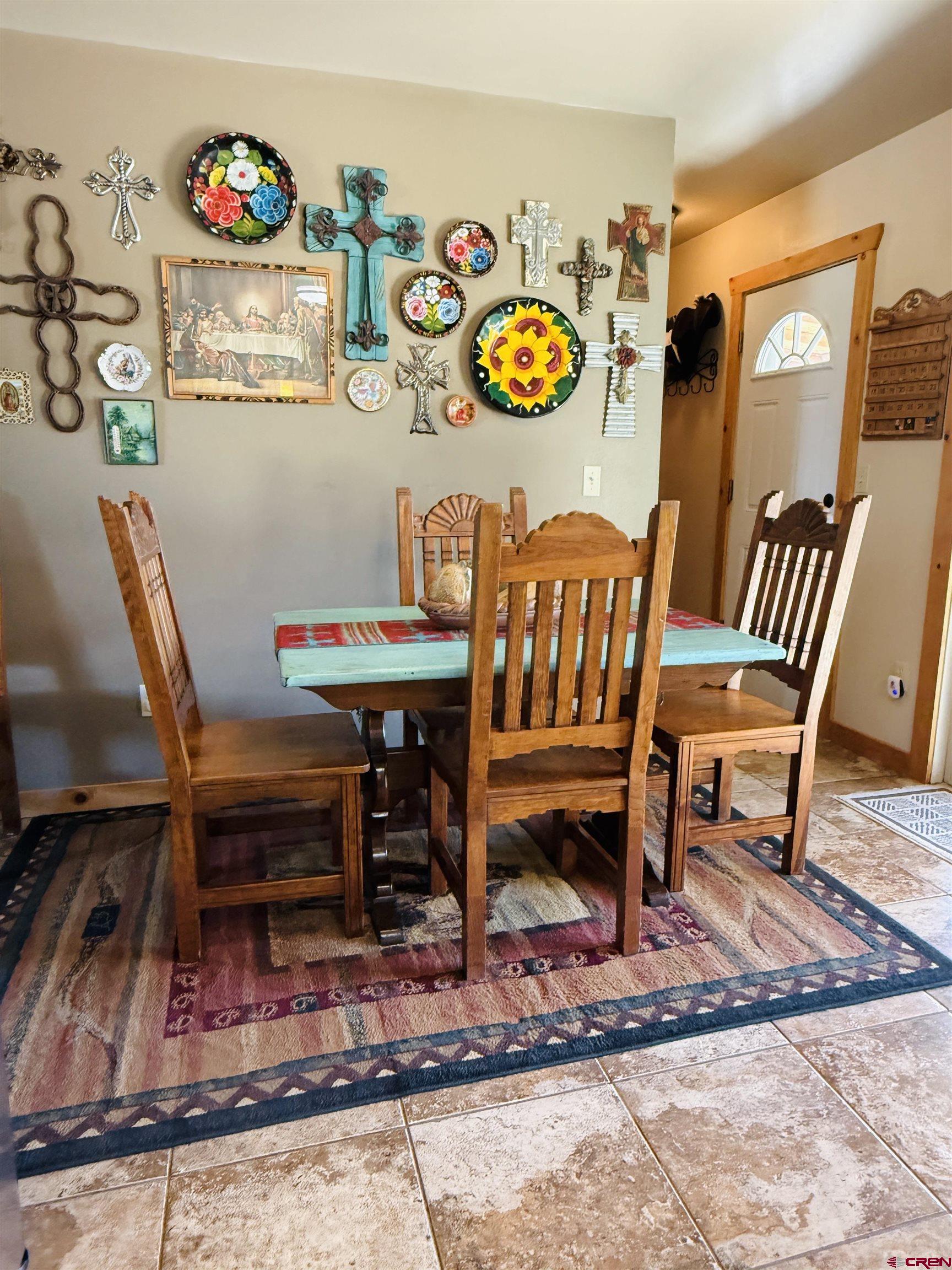 22680 E Road Delta, CO 81416 - Photo 16 of 31 a view of a dining room with furniture