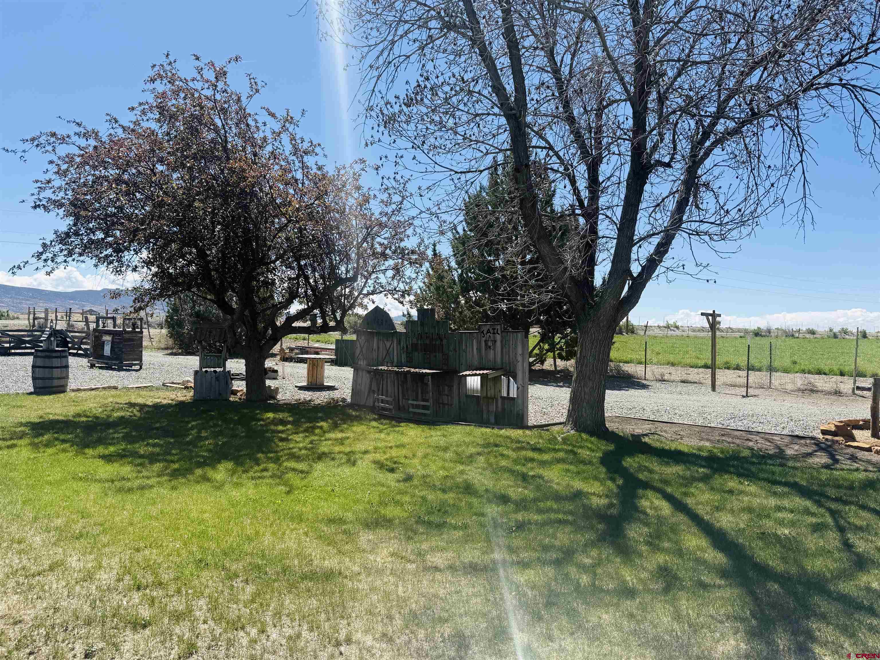 22680 E Road Delta, CO 81416 - Photo 28 of 31 a view of a yard with plants and trees