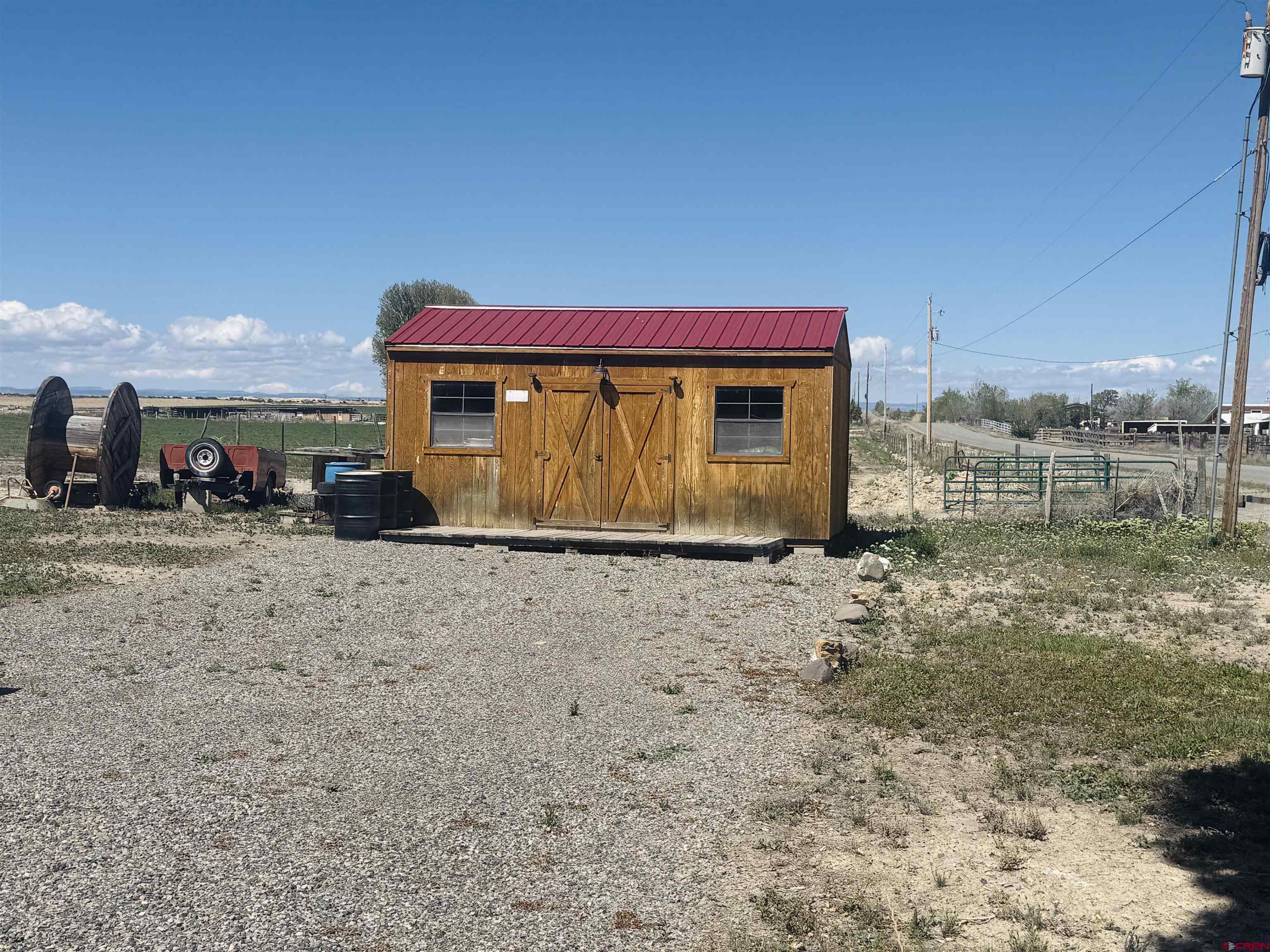 22680 E Road Delta, CO 81416 - Photo 31 of 31 a view of a house with a yard