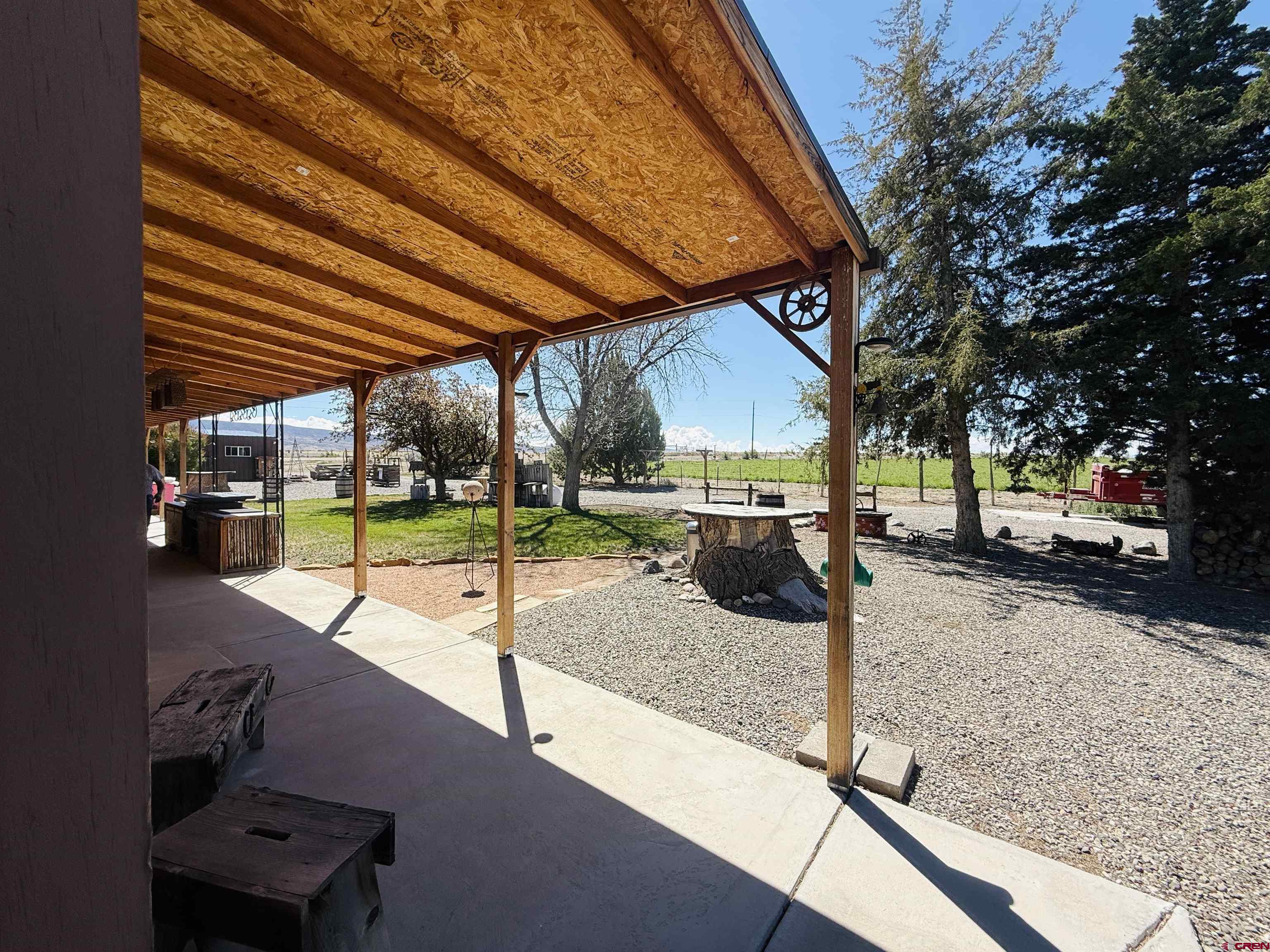 22680 E Road Delta, CO 81416 - Photo 7 of 31 a view of a backyard with sitting area