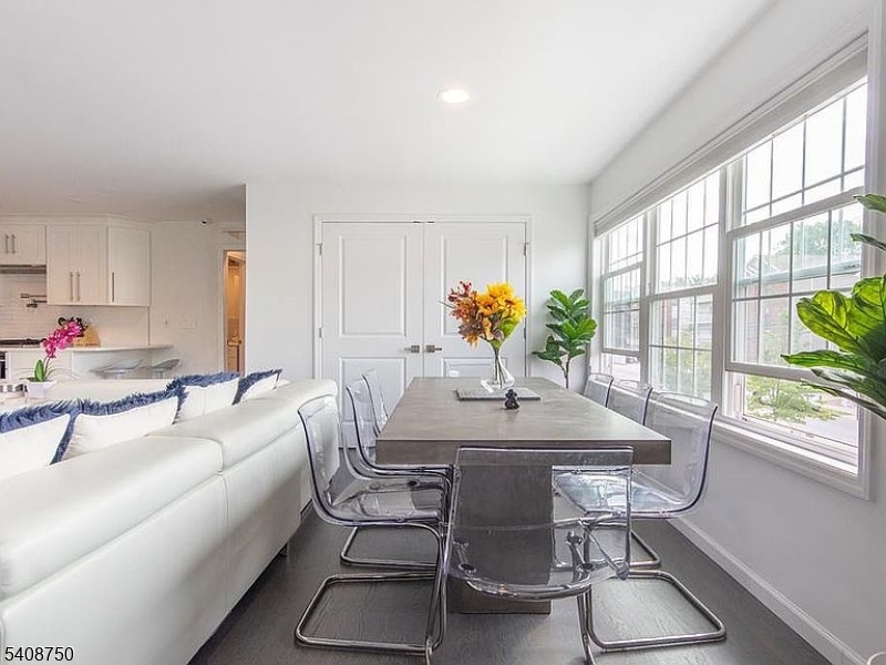 201 Catherine Street, Unit 1 Elizabeth, NJ 07201 - Photo 5 of 25 a view of a dining room with furniture window and outside view