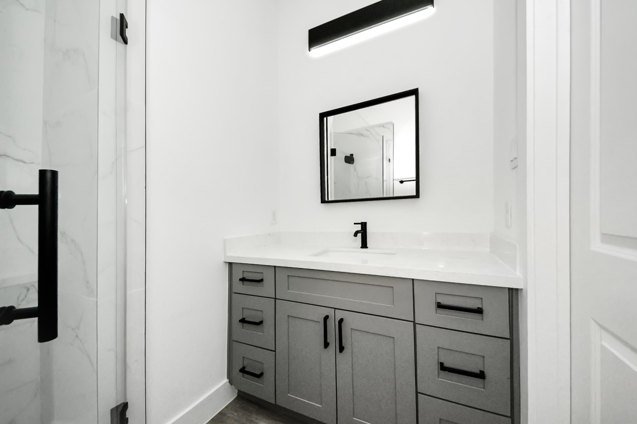 7412 Carver Road, Unit B Houston, TX 77088 - Photo 13 of 22 a bathroom with a sink and mirror