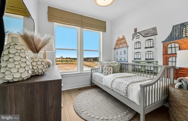 a bedroom with a bed and a book shelf